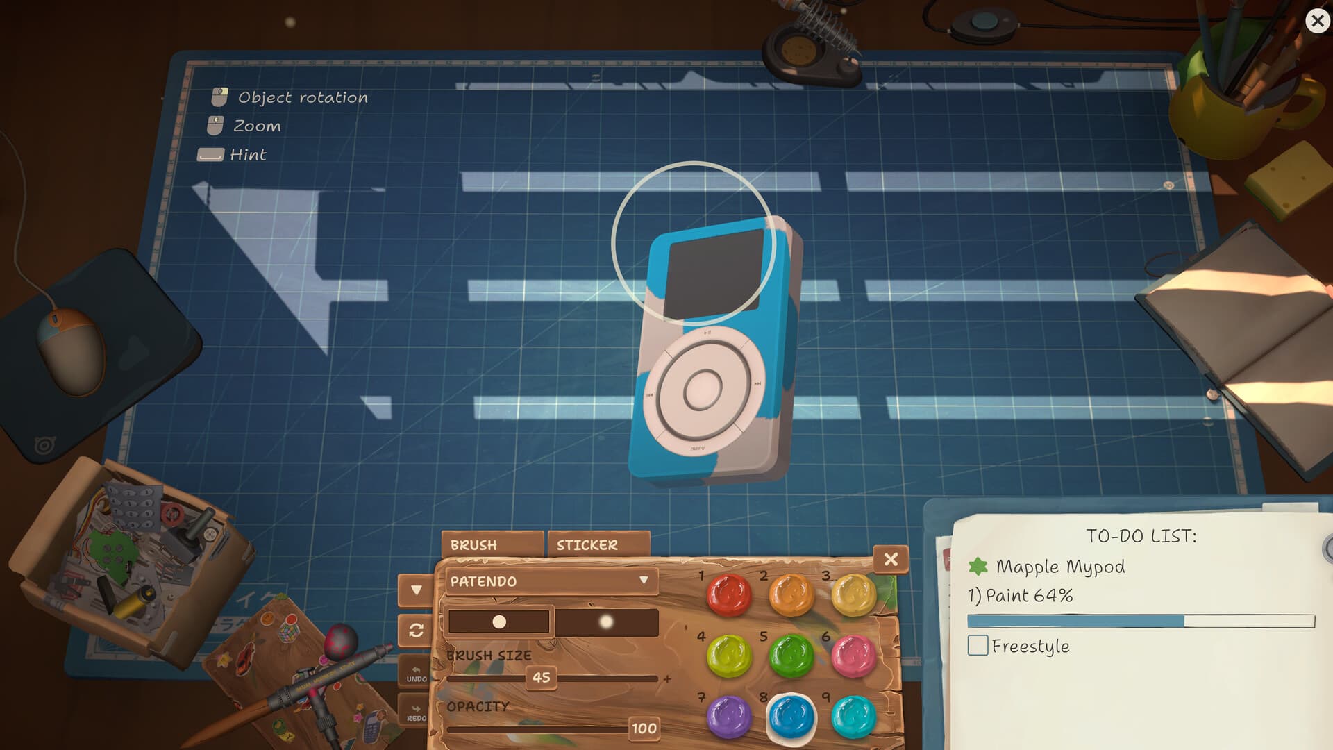 ReStory workbench with a compact device, paint tools, and a repair checklist